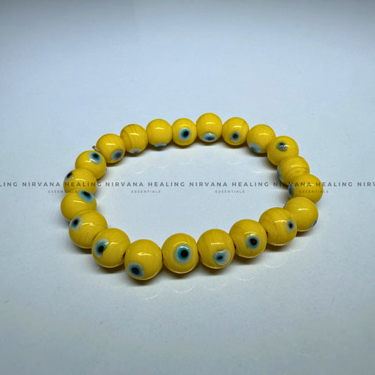 YELLOW EVIL EYE ROUND BEADED BRACELET (Optimism, Clarity, Protection) image 1