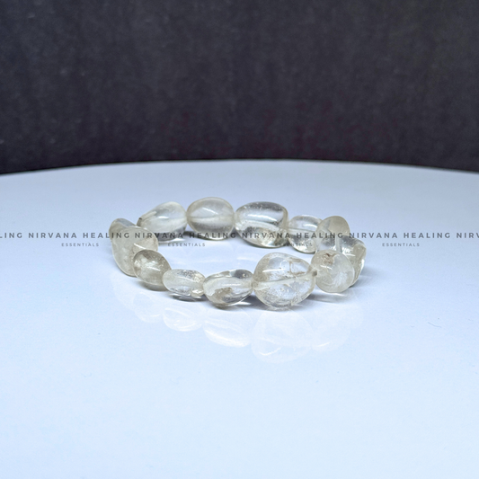 CLEAR QUARTZ TUMBLE OVAL BEADED BRACELET (Mental Clarity, Master Healer And Energy Amplifier).
image 1