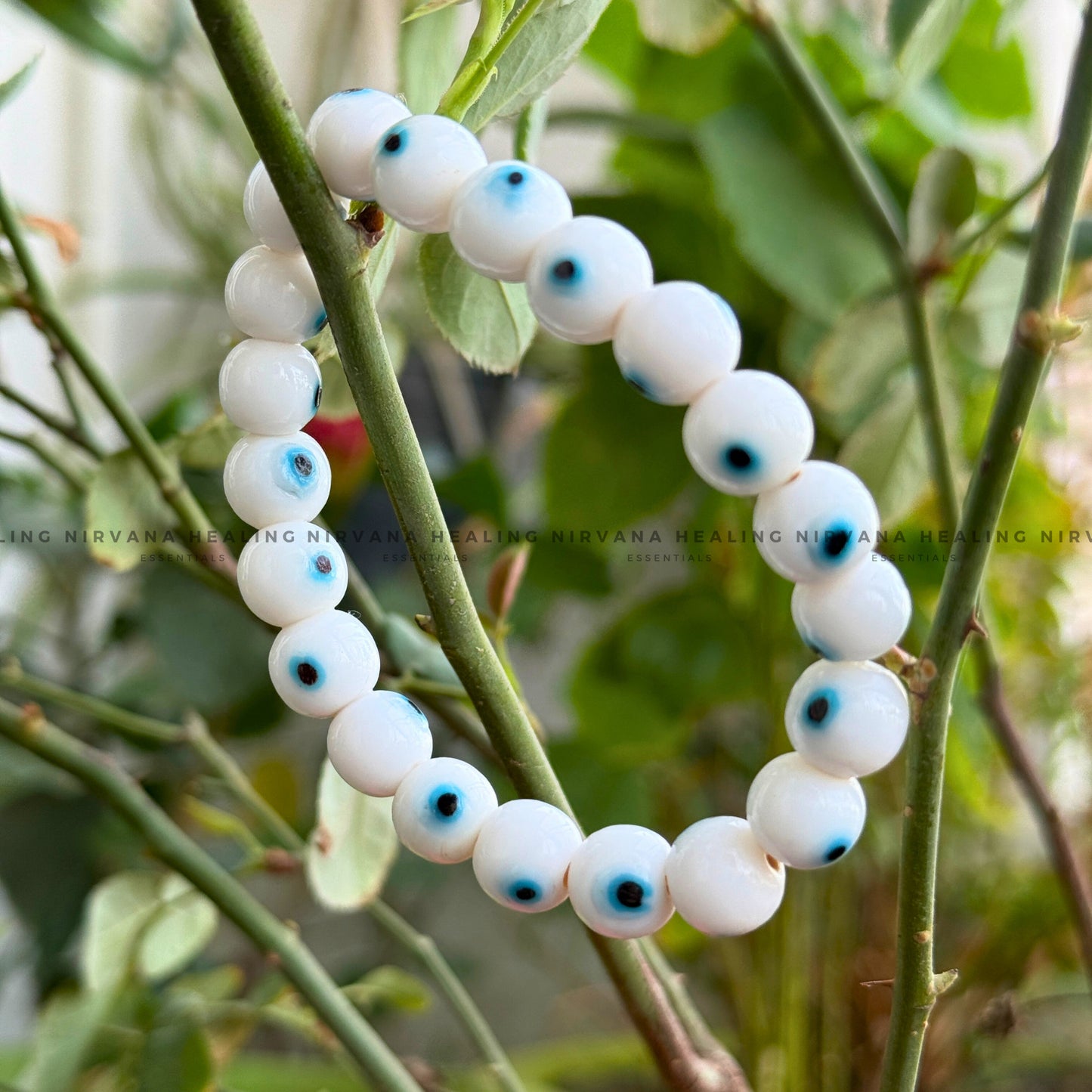 WHITE EVIL EYE ROUND BEADED BRACELET (Purity, Protection And New Beginnings) image 4