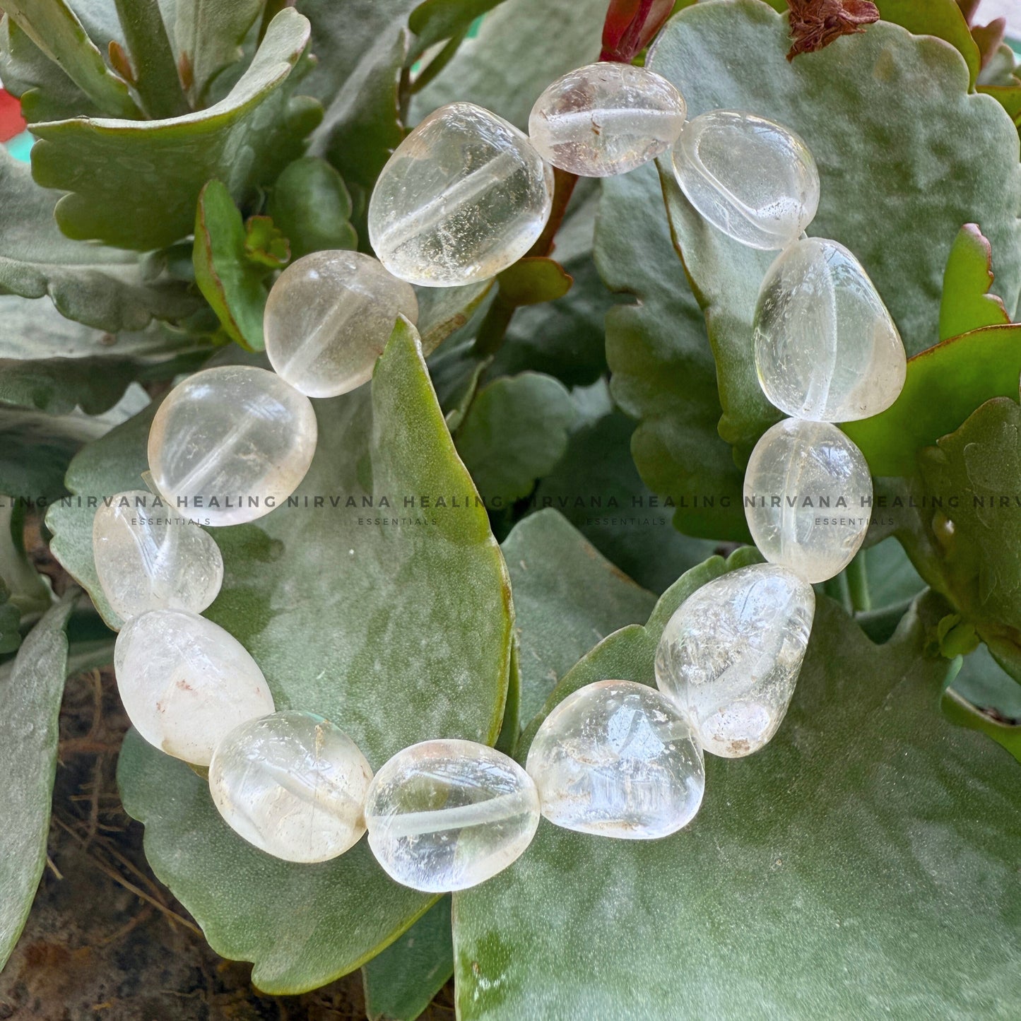 CLEAR QUARTZ TUMBLE OVAL BEADED BRACELET (Mental Clarity, Master Healer And Energy Amplifier).  image 3