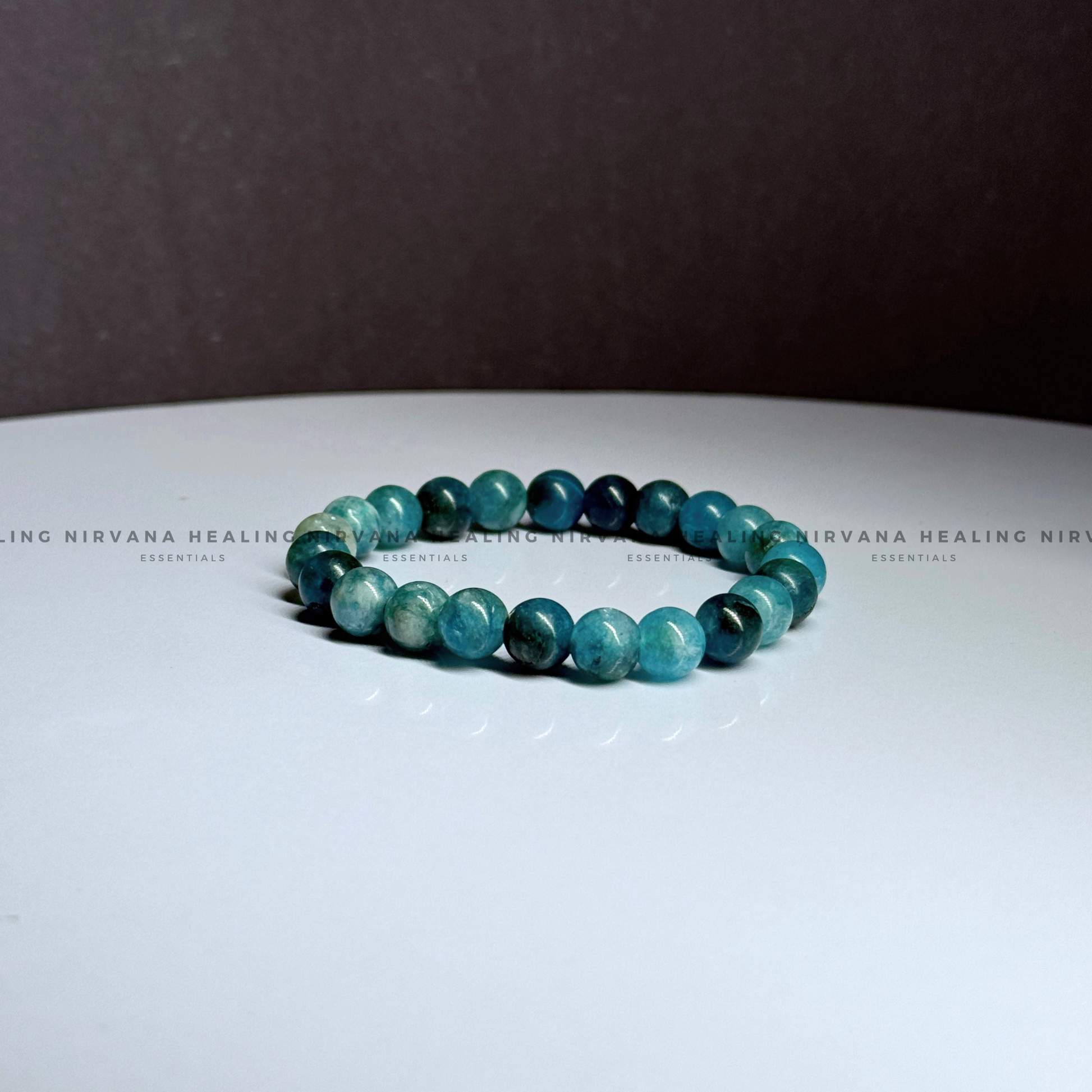 BLUE APATITE ROUND BEADED BRACELET (Goal Setting, Motivation, Manifestation, Communication). image 2
