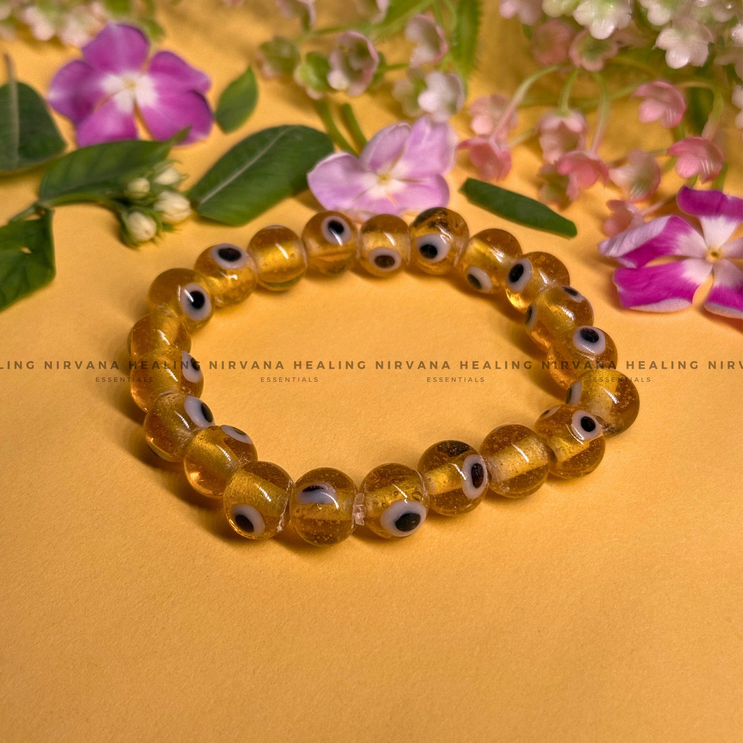 YELLOW CRYSTAL EVIL EYE ROUND BEADED BRACELET (Optimism, Clarity, Protection) image 0