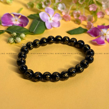 BLACK OM MANI PADME HUM ROUND BEADED BRACELET (Compassion, Protection, Spiritual Awakening) image 0
