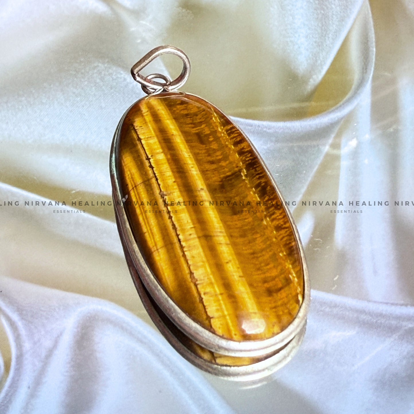 TIGER EYE CRYSTAL PENDANT (Bold, Courage, Willpower And Strength). image 0