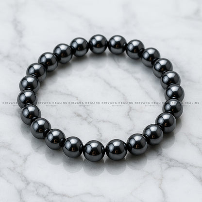 BLACK HEMATITE ROUND BEADED BRACELET (Grounding, Stability, Protection And Health) image 1