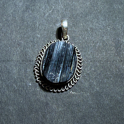 BLACK TOURMALINE RAW OVAL PENDANT (Protection, Grounding, Shielding And Growth) image 1