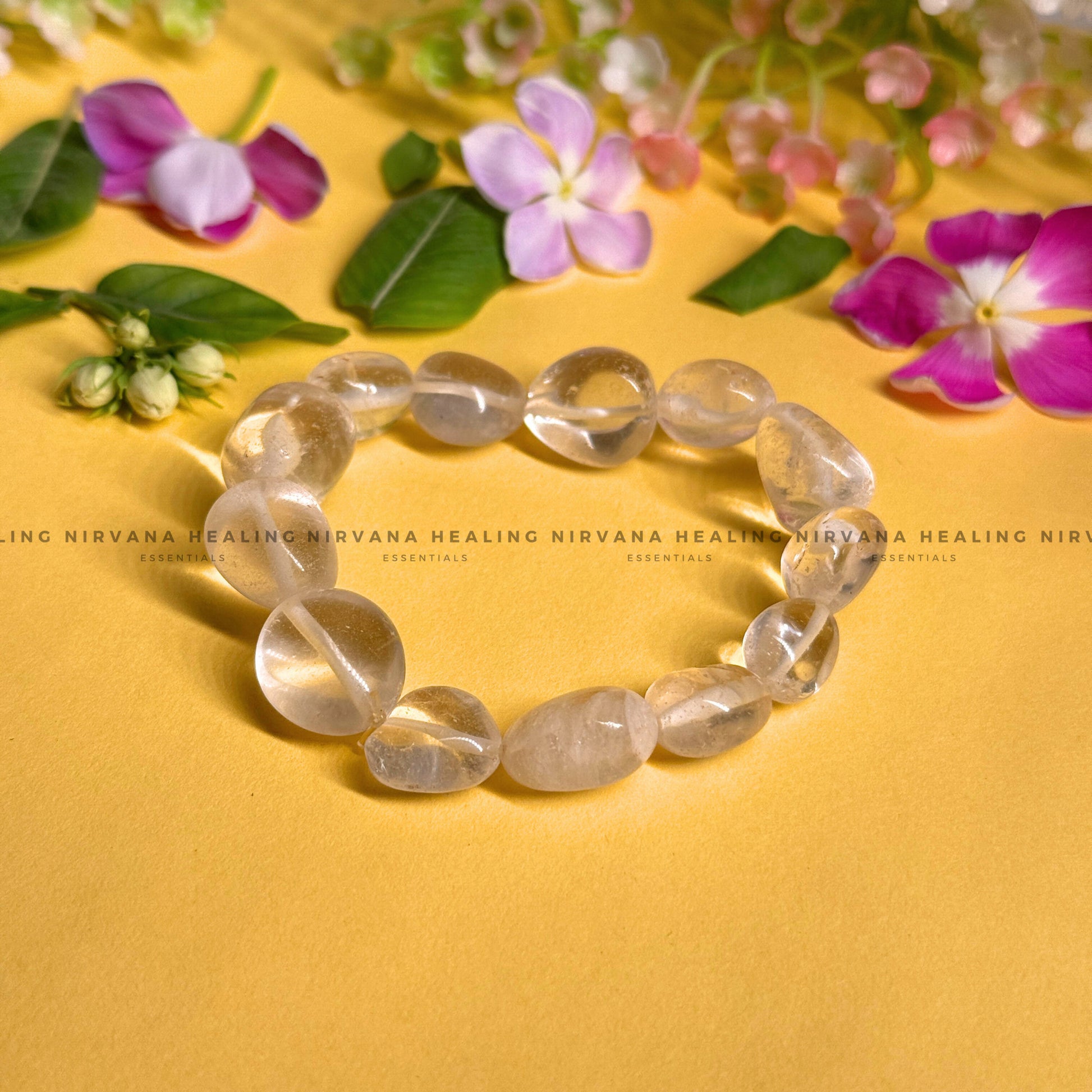 CLEAR QUARTZ TUMBLE OVAL BEADED BRACELET (Mental Clarity, Master Healer And Energy Amplifier).  image 0
