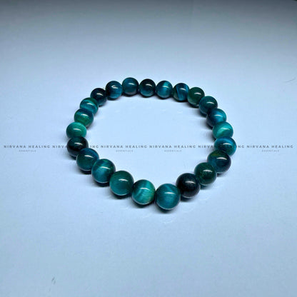 BLUE CATS EYE ROUND BEADED BRACELET (Protection, Strength And Energy Shield) image 1
