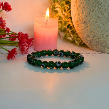 GREEN EVIL EYE ROUND BEADED BRACELET (Healing, Growth And Protection) image 1