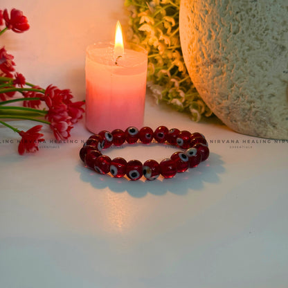 CRYSTAL RED EVIL EYE ROUND BEADS BRACELET (Ward Off Negativity, Envy And Harmful Intentions) image 1