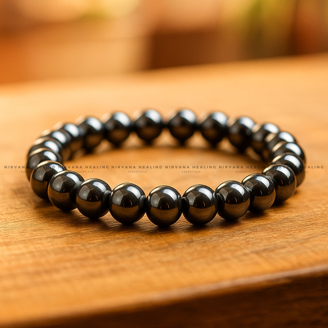 BLACK HEMATITE ROUND BEADED BRACELET (Grounding, Stability, Protection And Health) image 0