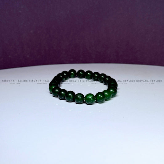 GREEN JADE ROUND BEADED BRACELET (Luck, Harmony, Peace And Abundance) image 1
