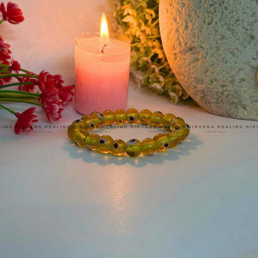 YELLOW CRYSTAL EVIL EYE ROUND BEADED BRACELET (Optimism, Clarity, Protection) image 1
