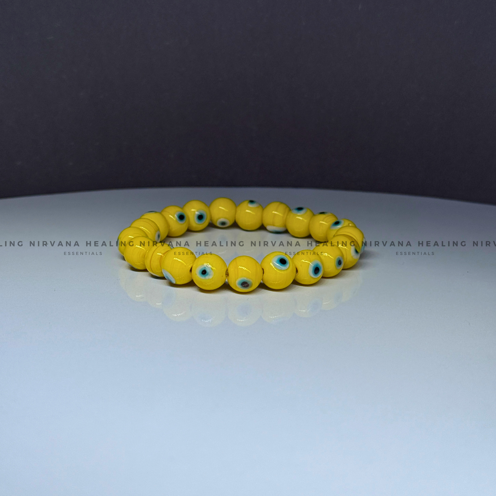 YELLOW EVIL EYE ROUND BEADED BRACELET (Optimism, Clarity, Protection) image 2