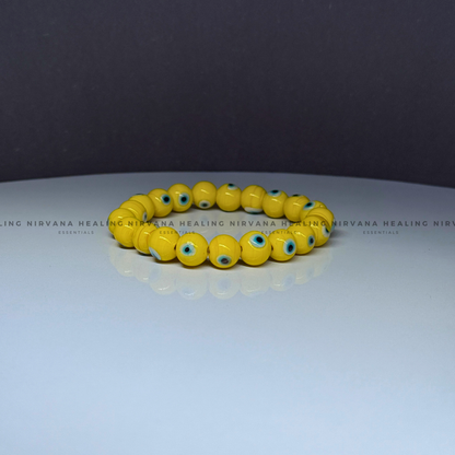 YELLOW EVIL EYE ROUND BEADED BRACELET (Optimism, Clarity, Protection) image 2