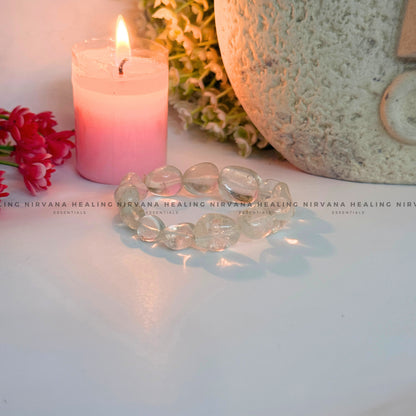 CLEAR QUARTZ TUMBLE OVAL BEADED BRACELET (Mental Clarity, Master Healer And Energy Amplifier).  image 2