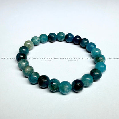 BLUE APATITE ROUND BEADED BRACELET (Goal Setting, Motivation, Manifestation, Communication). image 1