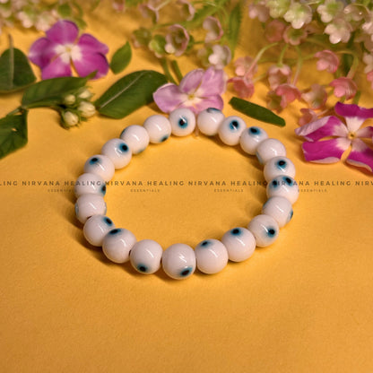 WHITE EVIL EYE ROUND BEADED BRACELET (Purity, Protection And New Beginnings) image 0