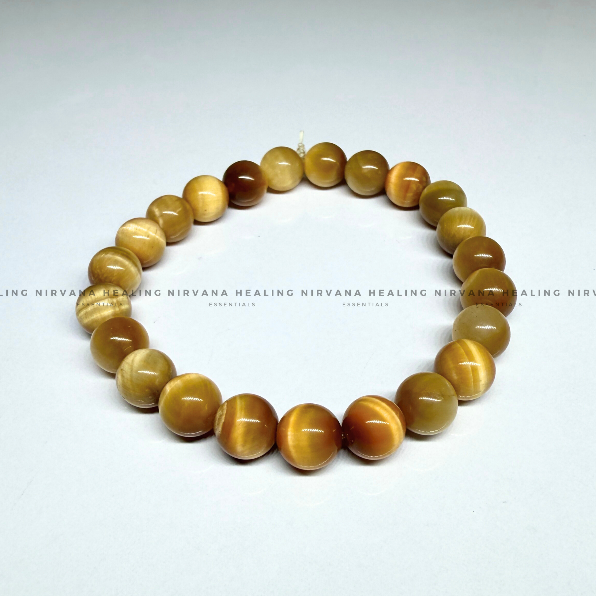 YELLOW CATS EYE ROUND BEADED BRACELET (Balance, Purity And Divine Protection) image 1