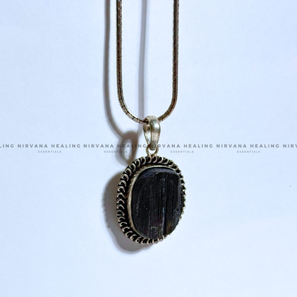 BLACK TOURMALINE RAW OVAL PENDANT (Protection, Grounding, Shielding And Growth) image 6