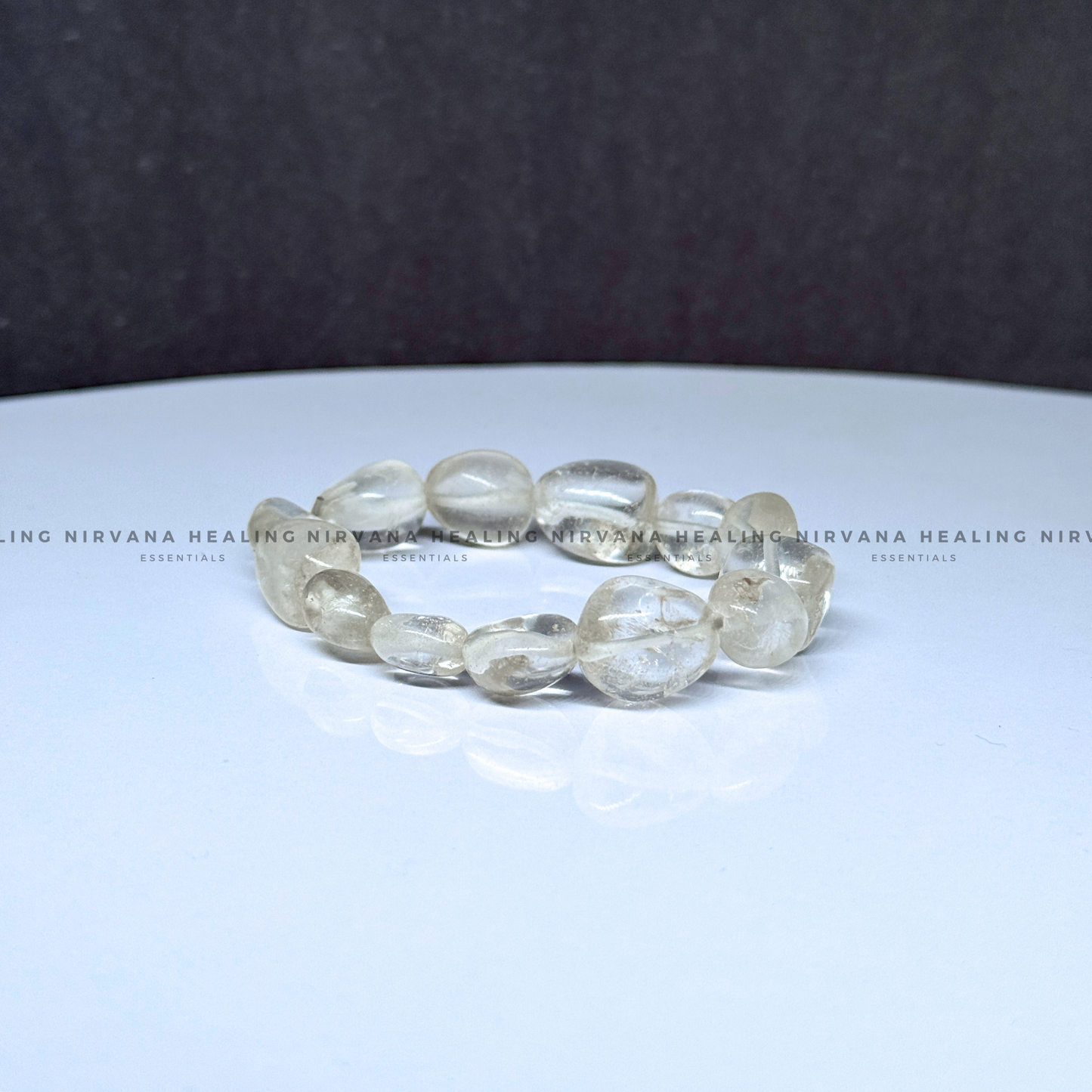 CLEAR QUARTZ TUMBLE OVAL BEADED BRACELET (Mental Clarity, Master Healer And Energy Amplifier).  image 1