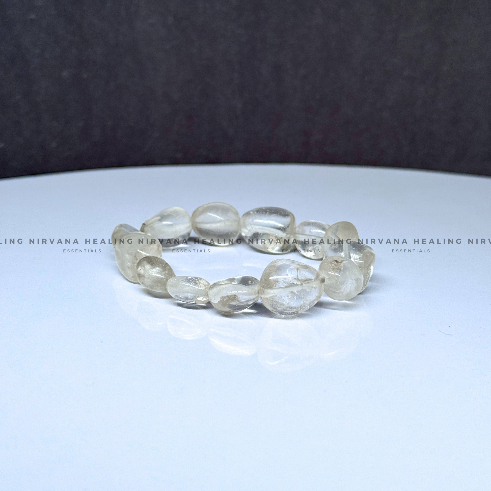CLEAR QUARTZ TUMBLE OVAL BEADED BRACELET (Mental Clarity, Master Healer And Energy Amplifier).  image 1