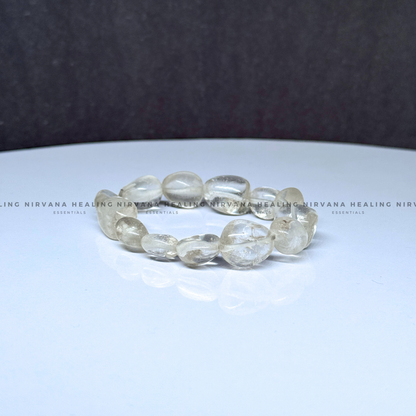 CLEAR QUARTZ TUMBLE OVAL BEADED BRACELET (Mental Clarity, Master Healer And Energy Amplifier).  image 1