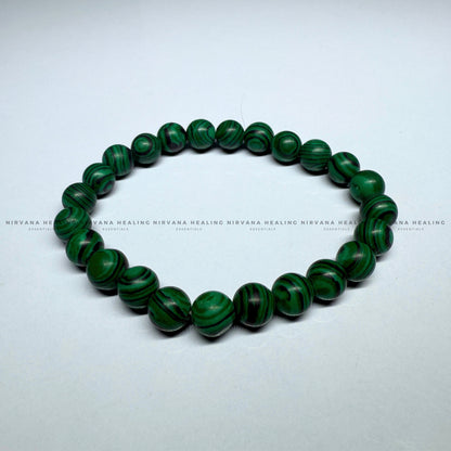 MALACHITE ROUND BEADED BRACELET (Transformation, Pain Reliever And Emotional Healing) image 1