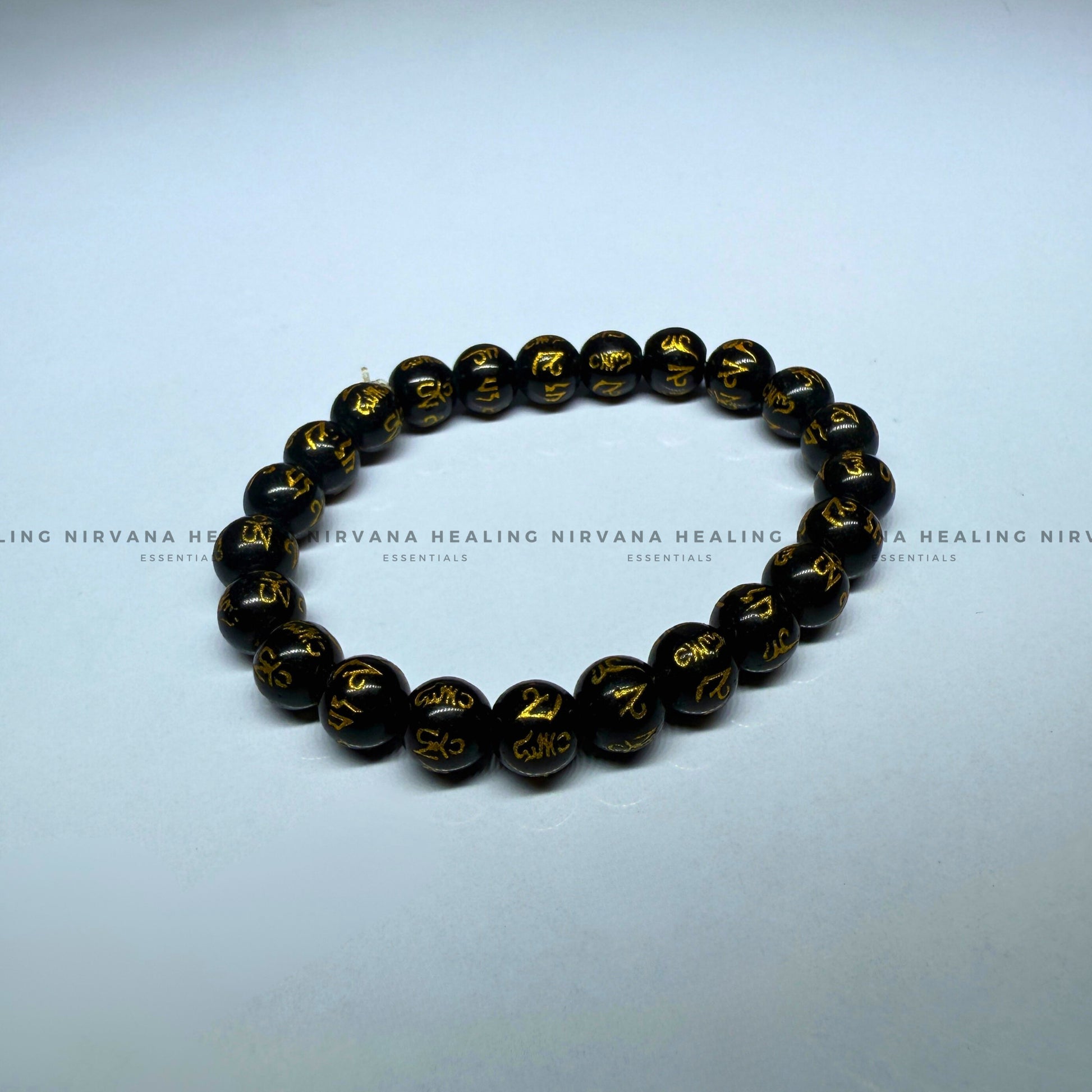BLACK OM MANI PADME HUM ROUND BEADED BRACELET (Compassion, Protection, Spiritual Awakening) image 1
