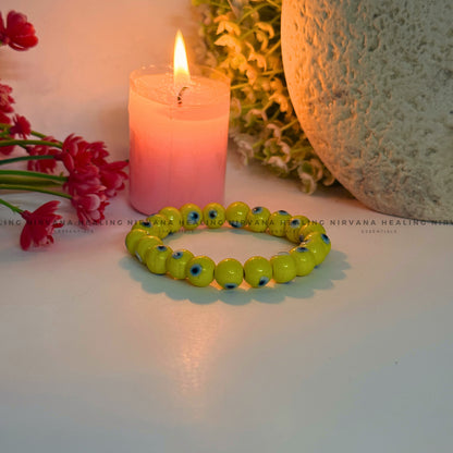 YELLOW EVIL EYE ROUND BEADED BRACELET (Optimism, Clarity, Protection) image 3