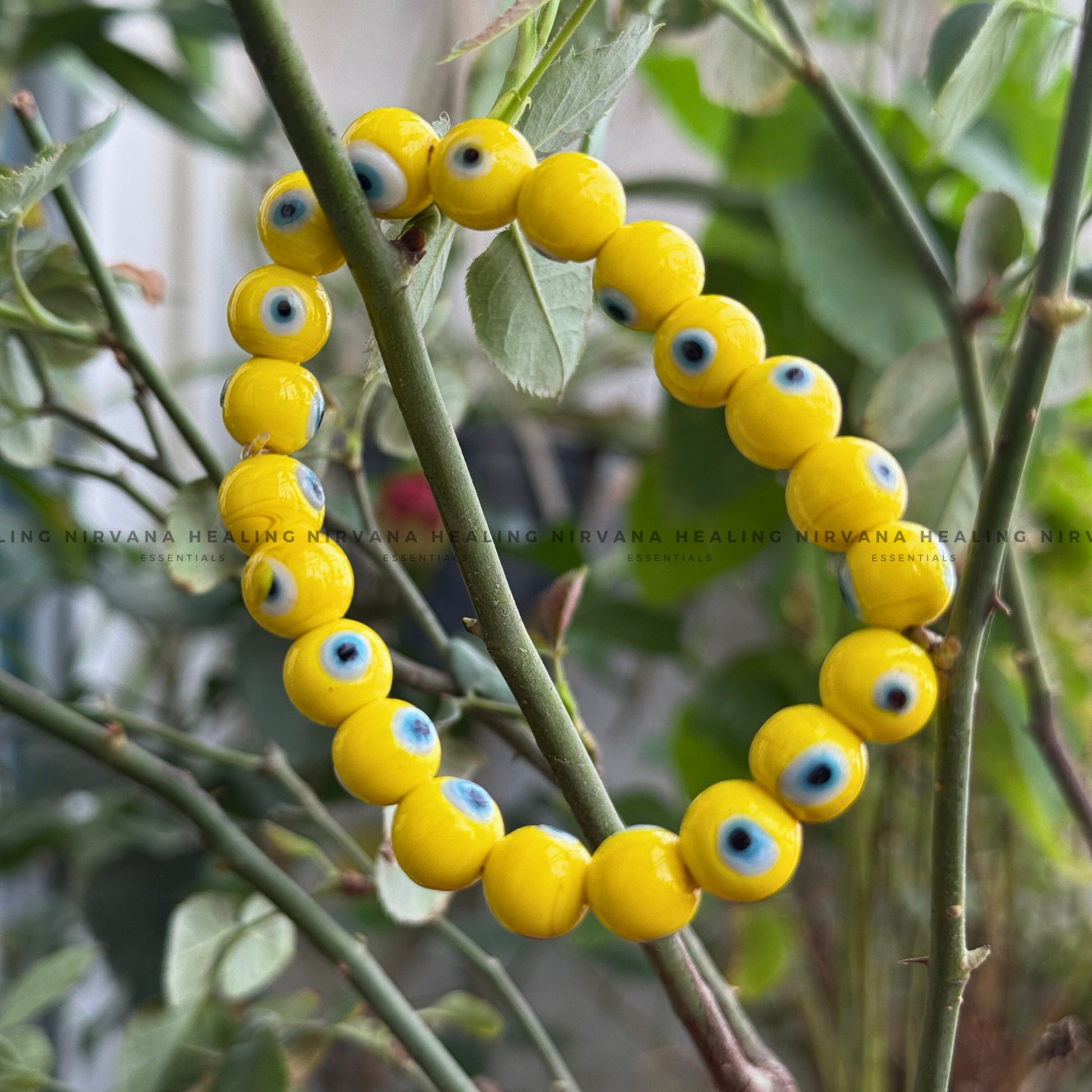 YELLOW EVIL EYE ROUND BEADED BRACELET (Optimism, Clarity, Protection) image 4