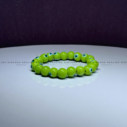 GREEN EVIL EYE ROUND BEADED BRACELET (Healing, Growth And Protection) image 1