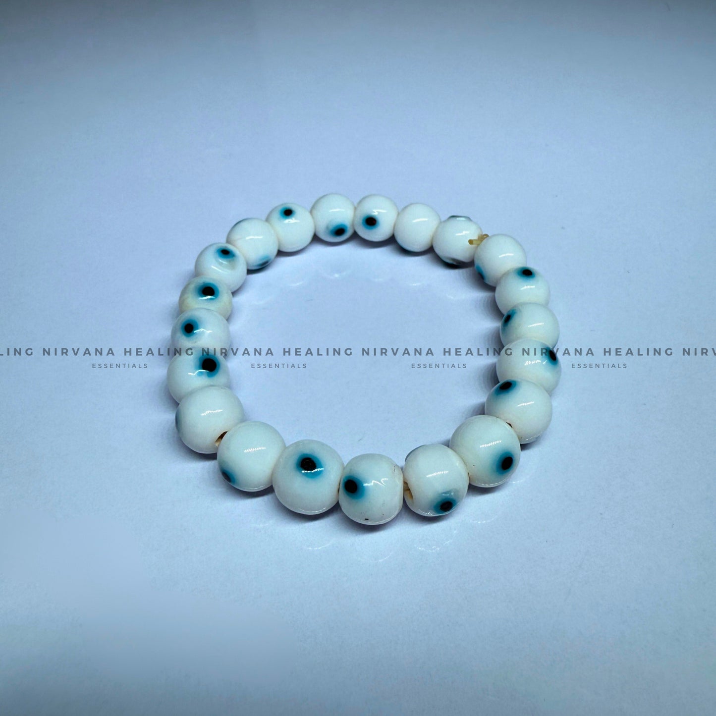 WHITE EVIL EYE ROUND BEADED BRACELET (Purity, Protection And New Beginnings) image 1