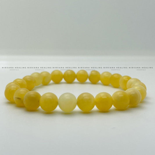 YELLOW CALCITE ROUND BEADED BRACELET (Self Confidence, Self Worth, Will Power And Motivation) image 1