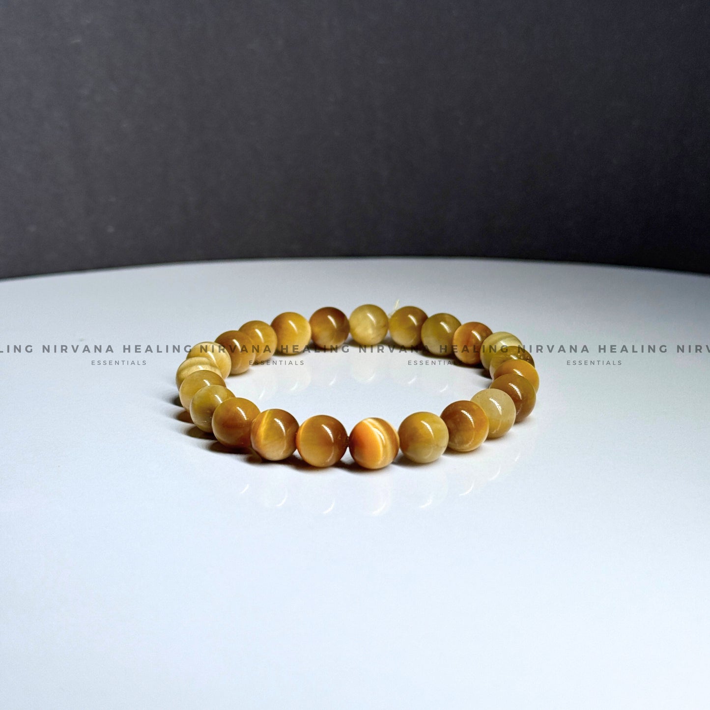 YELLOW CATS EYE ROUND BEADED BRACELET (Balance, Purity And Divine Protection) image 3
