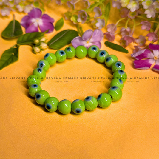 GREEN EVIL EYE ROUND BEADED BRACELET (Healing, Growth And Protection) image 0