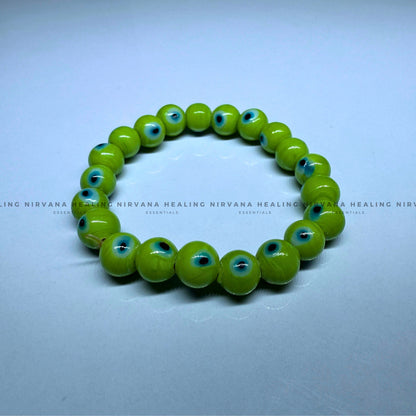 GREEN EVIL EYE ROUND BEADED BRACELET (Healing, Growth And Protection) image 2
