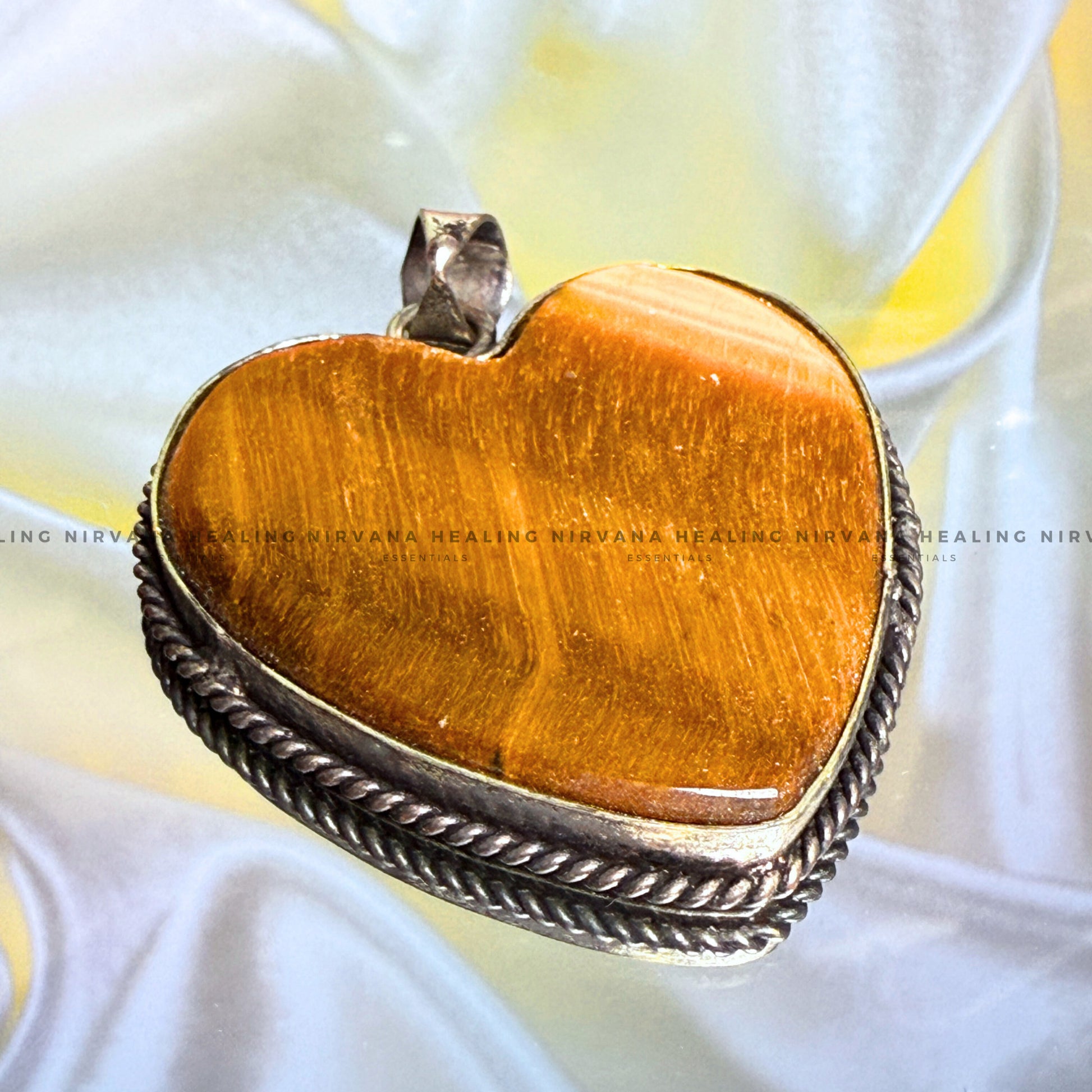 TIGER EYE HEART SHAPED PENDANT (Bold, Courage, Willpower And Strength). image 0